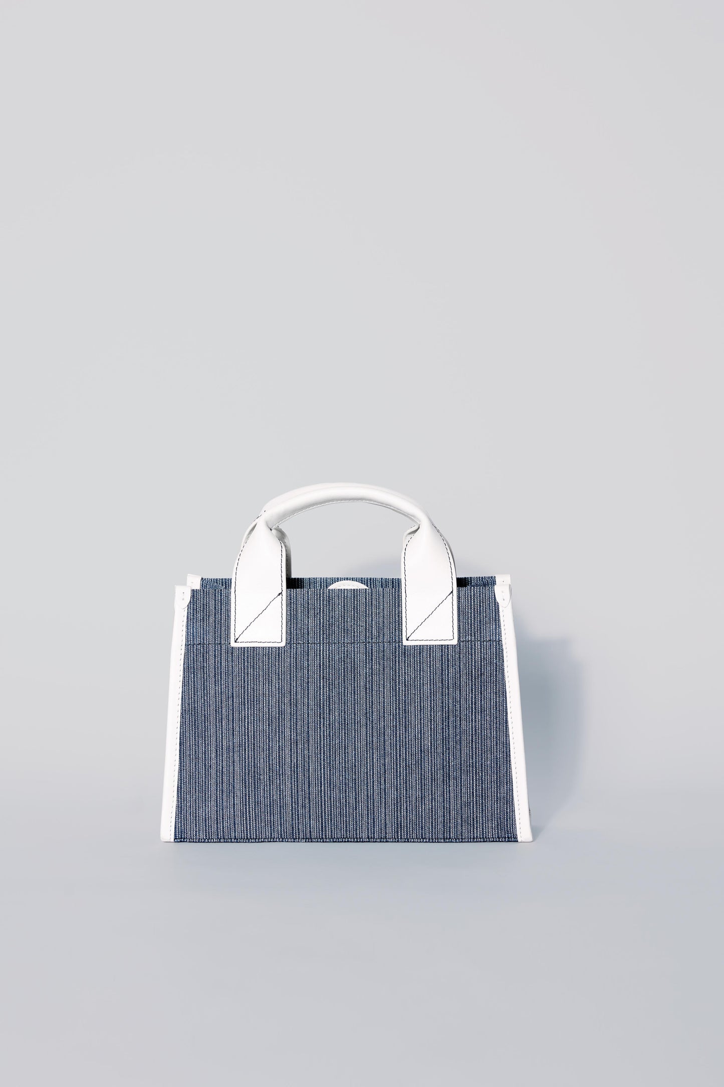 STITCHED POCKET MINI TOTE IN MARINE AND OFF-WHITE