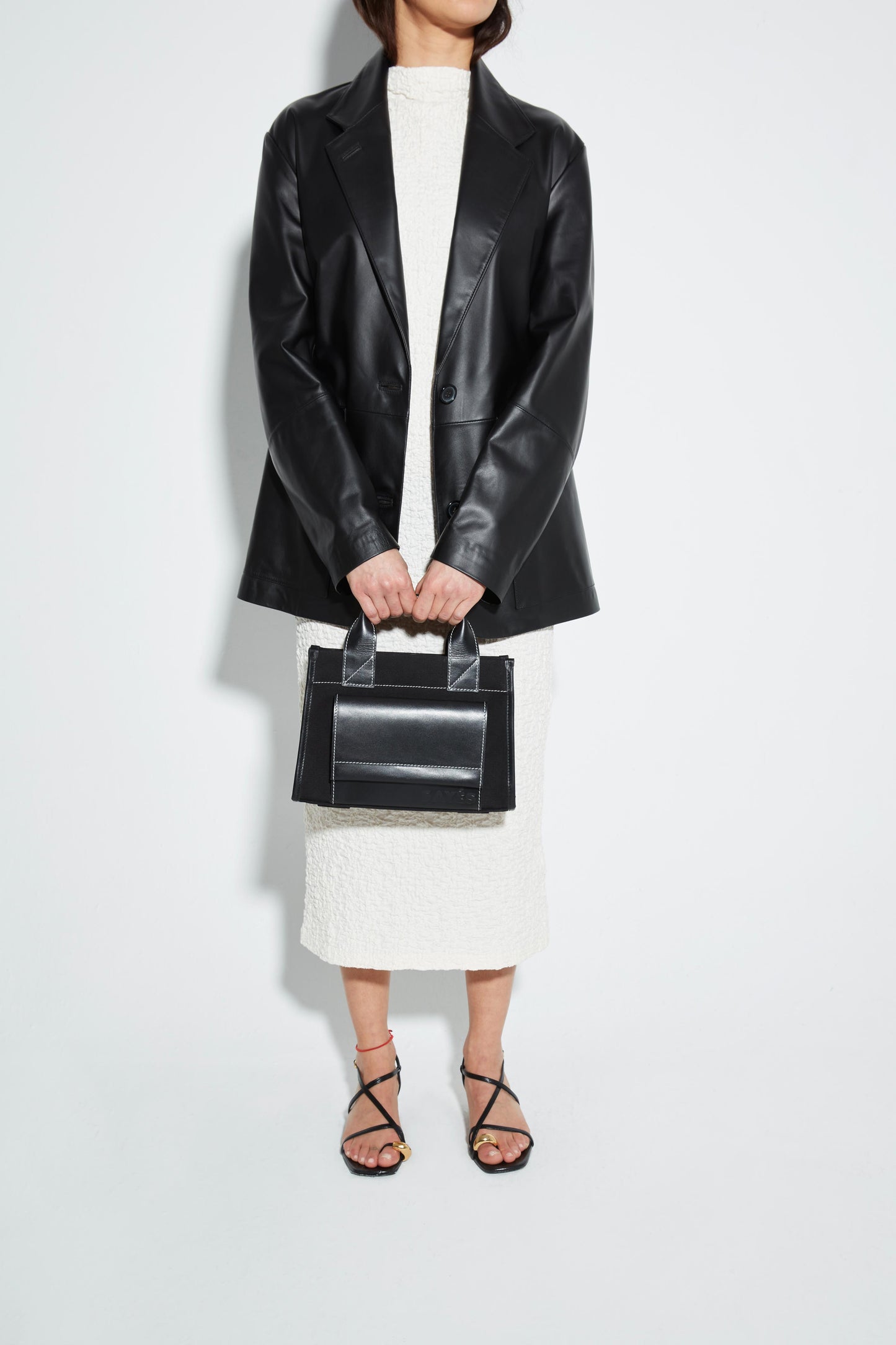 STITCHED POCKET MINI TOTE BAG IN BLACK WITH OFF-WHITE EDGES
