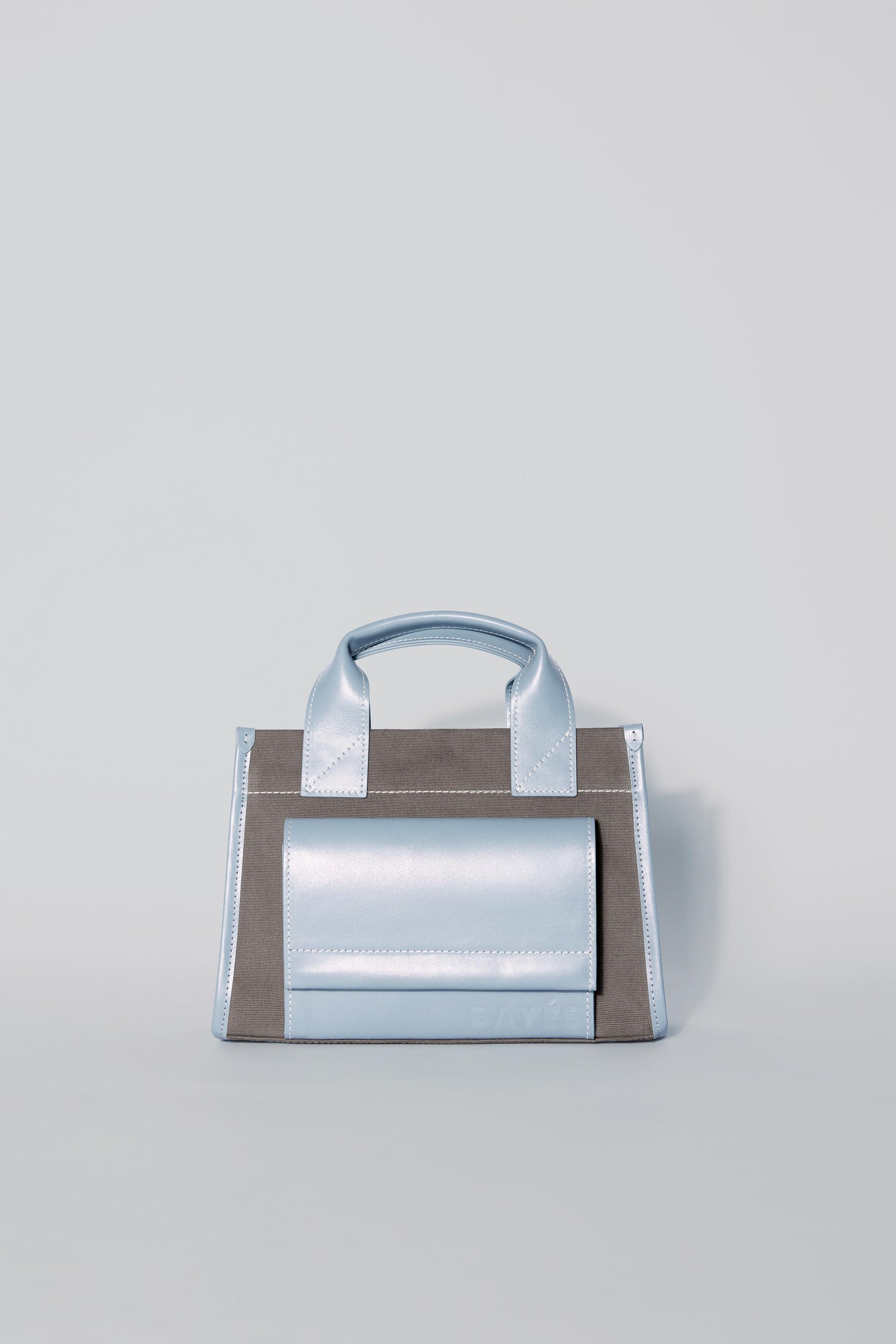 STITCHED POCKET MINI TOTE IN MINK AND BLUE