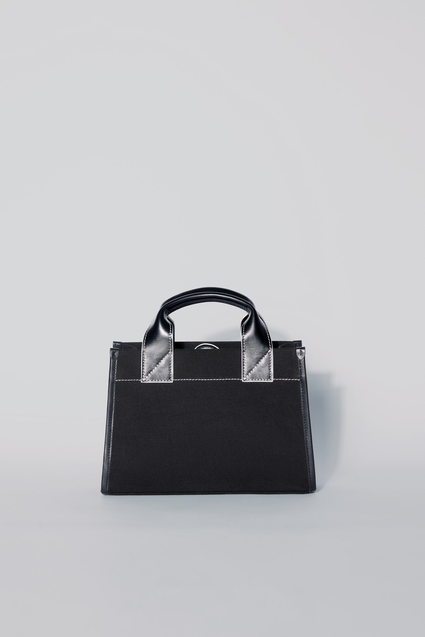 STITCHED POCKET MINI TOTE BAG IN BLACK WITH OFF-WHITE EDGES