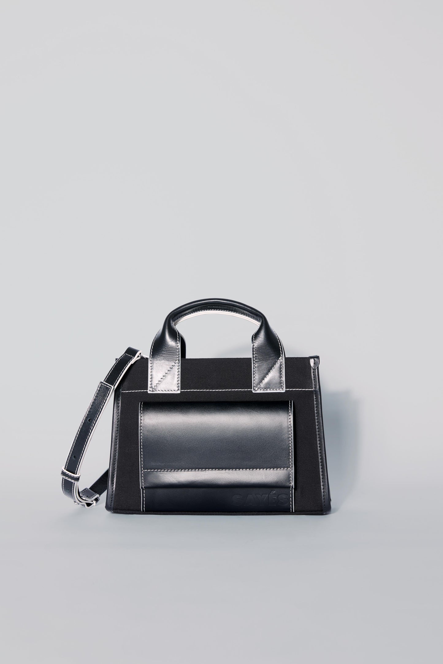 STITCHED POCKET MINI TOTE BAG IN BLACK WITH OFF-WHITE EDGES