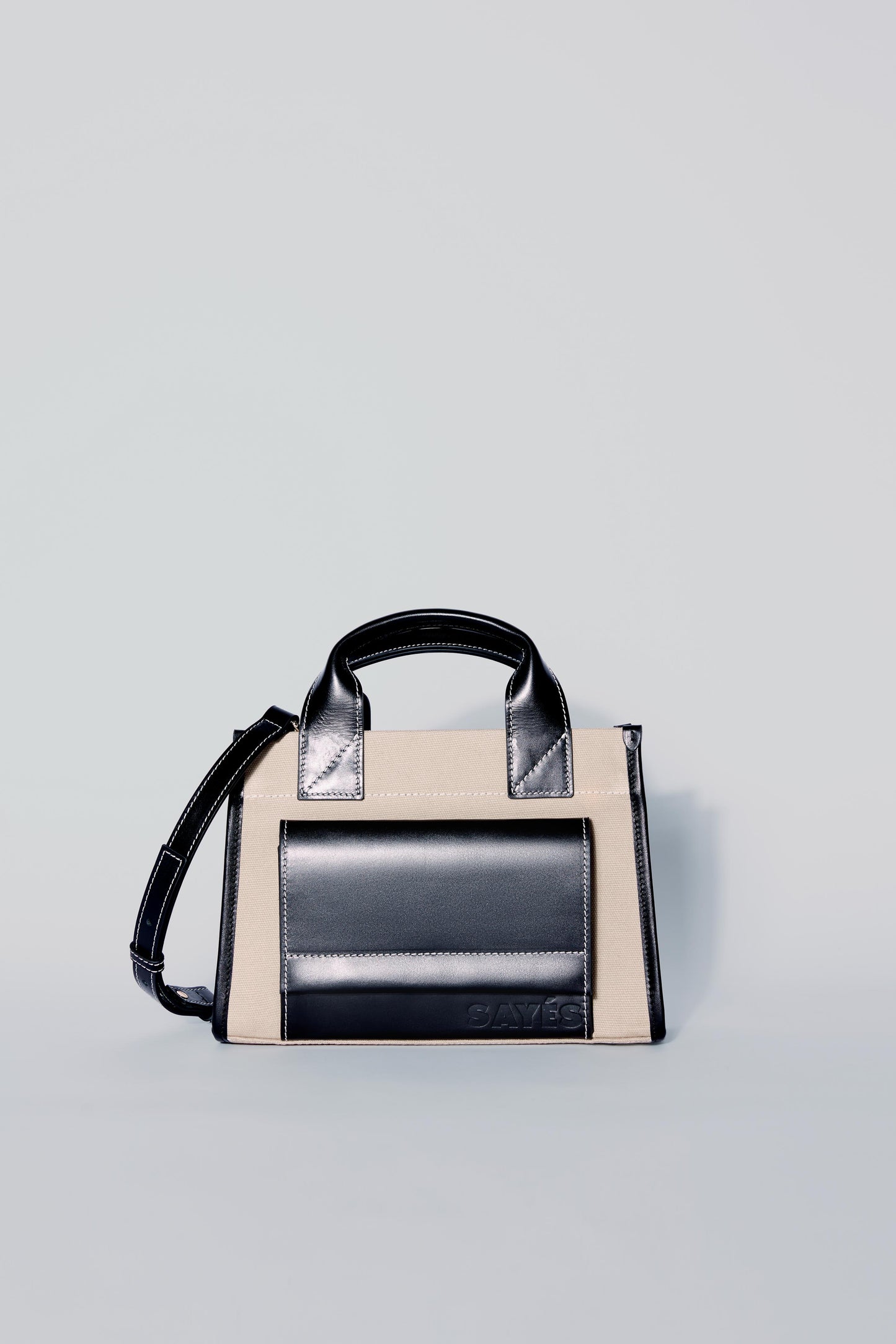 STITCHED POCKET MINI TOTE IN BEIGE AND BLACK
