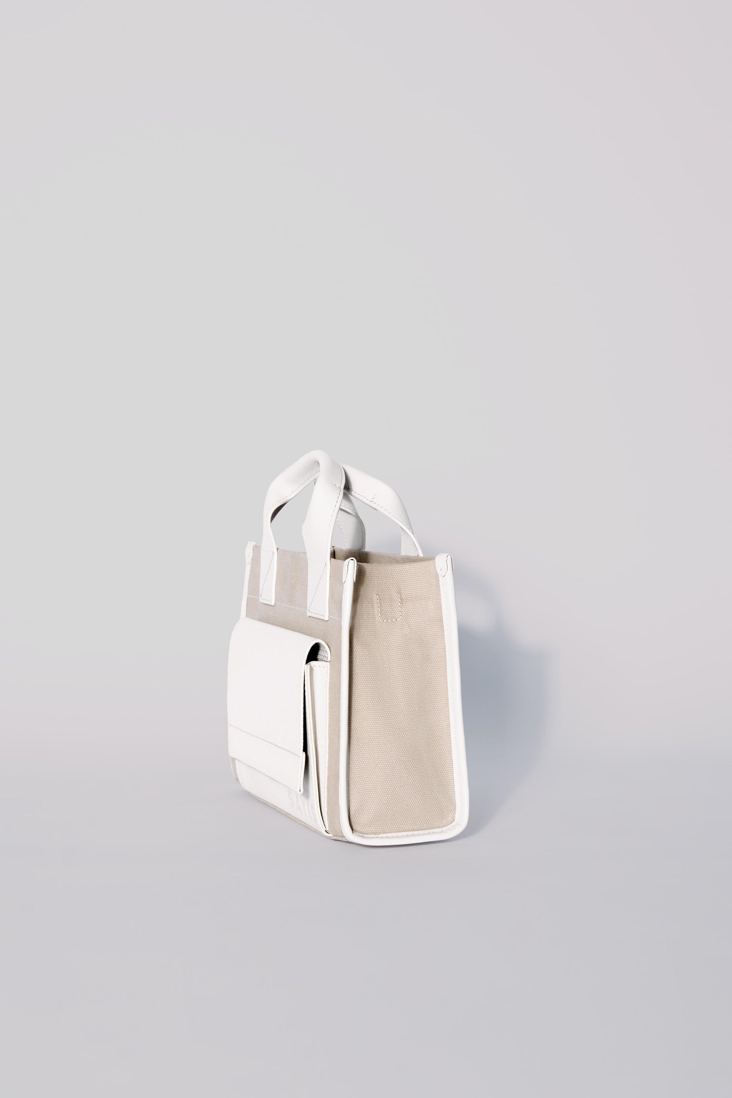 STITCHED POCKET MINI TOTE IN BEIGE AND OFF-WHITE