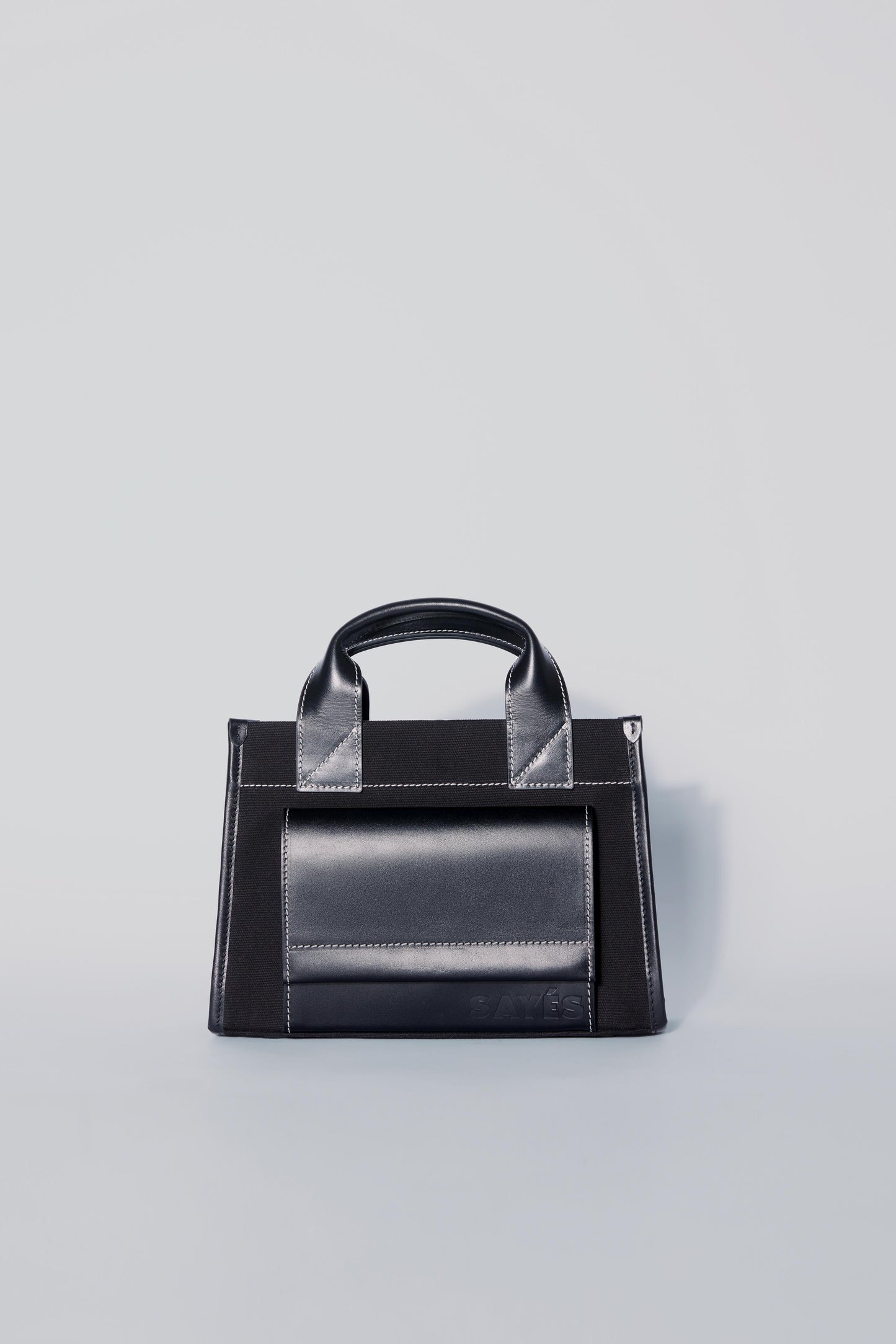 STITCHED POCKET MINI TOTE BAG IN BLACK
