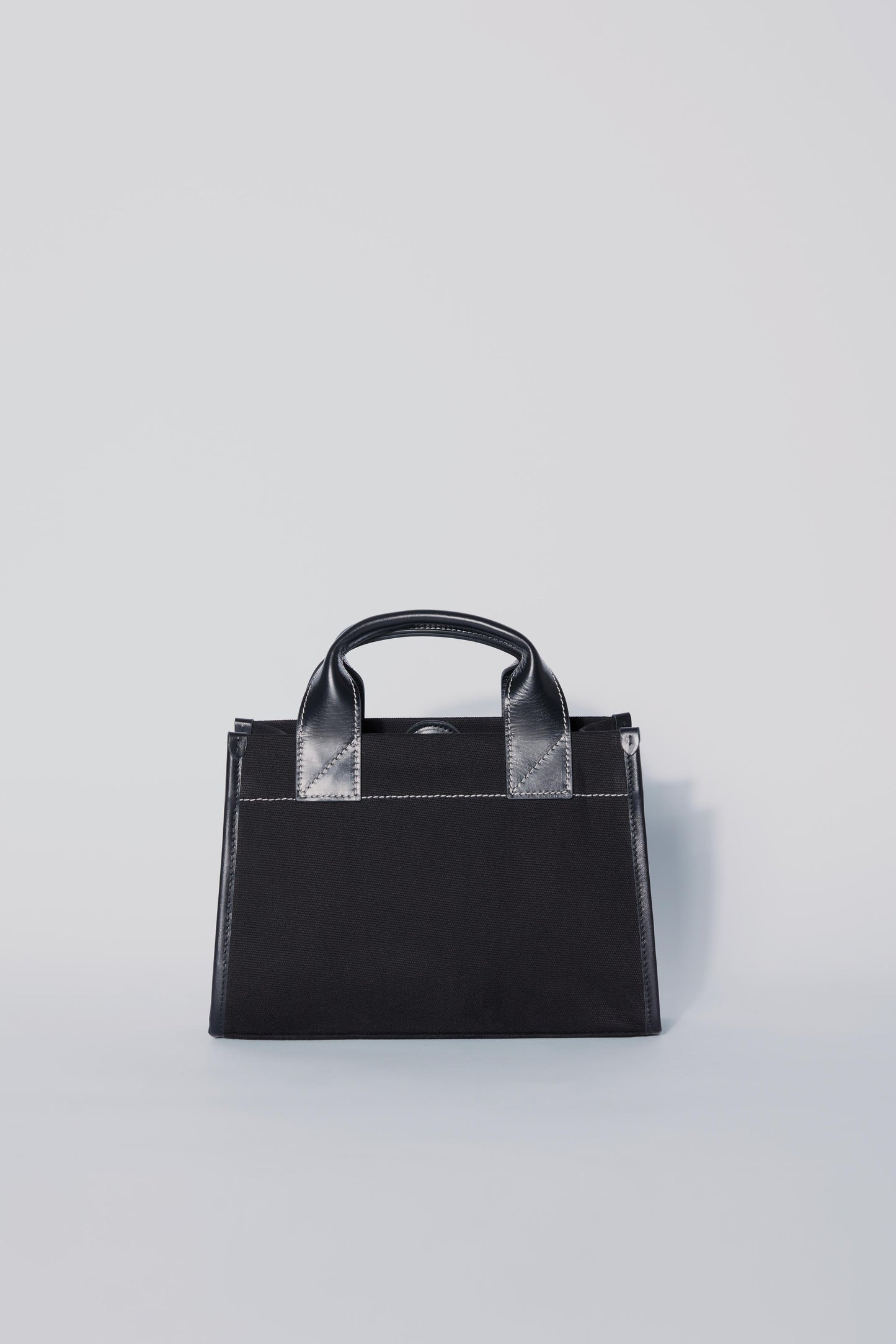 STITCHED POCKET MINI TOTE IN BLACK