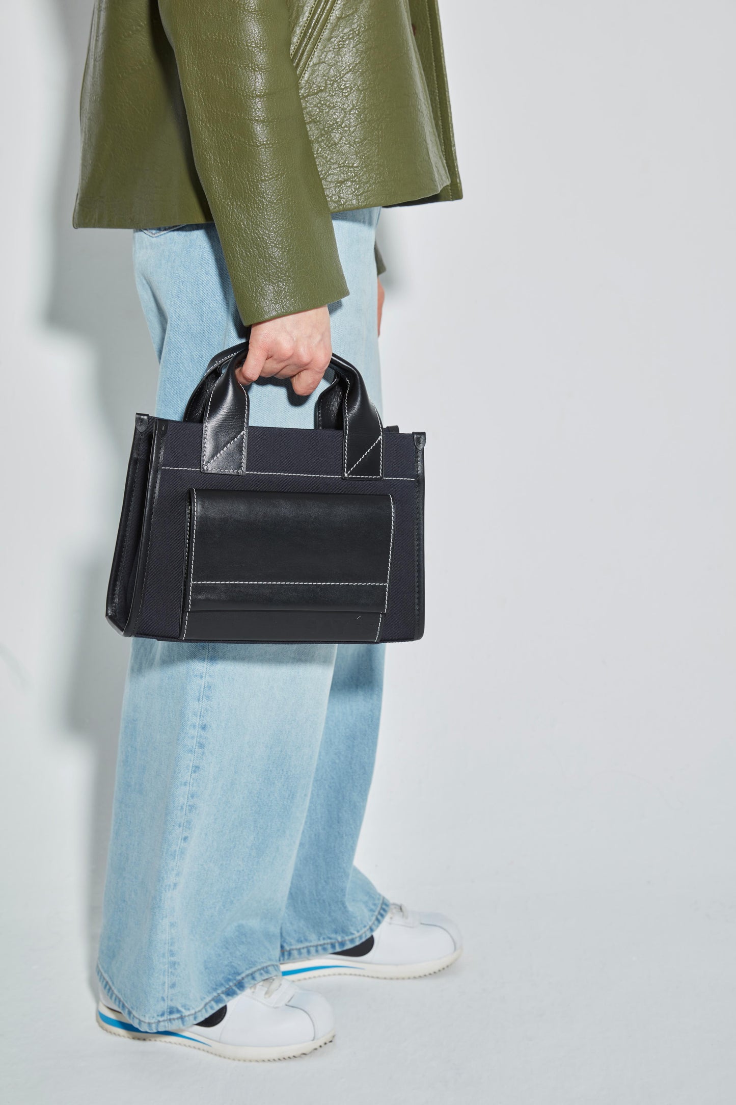 STITCHED POCKET MINI TOTE IN NAVY AND BLACK