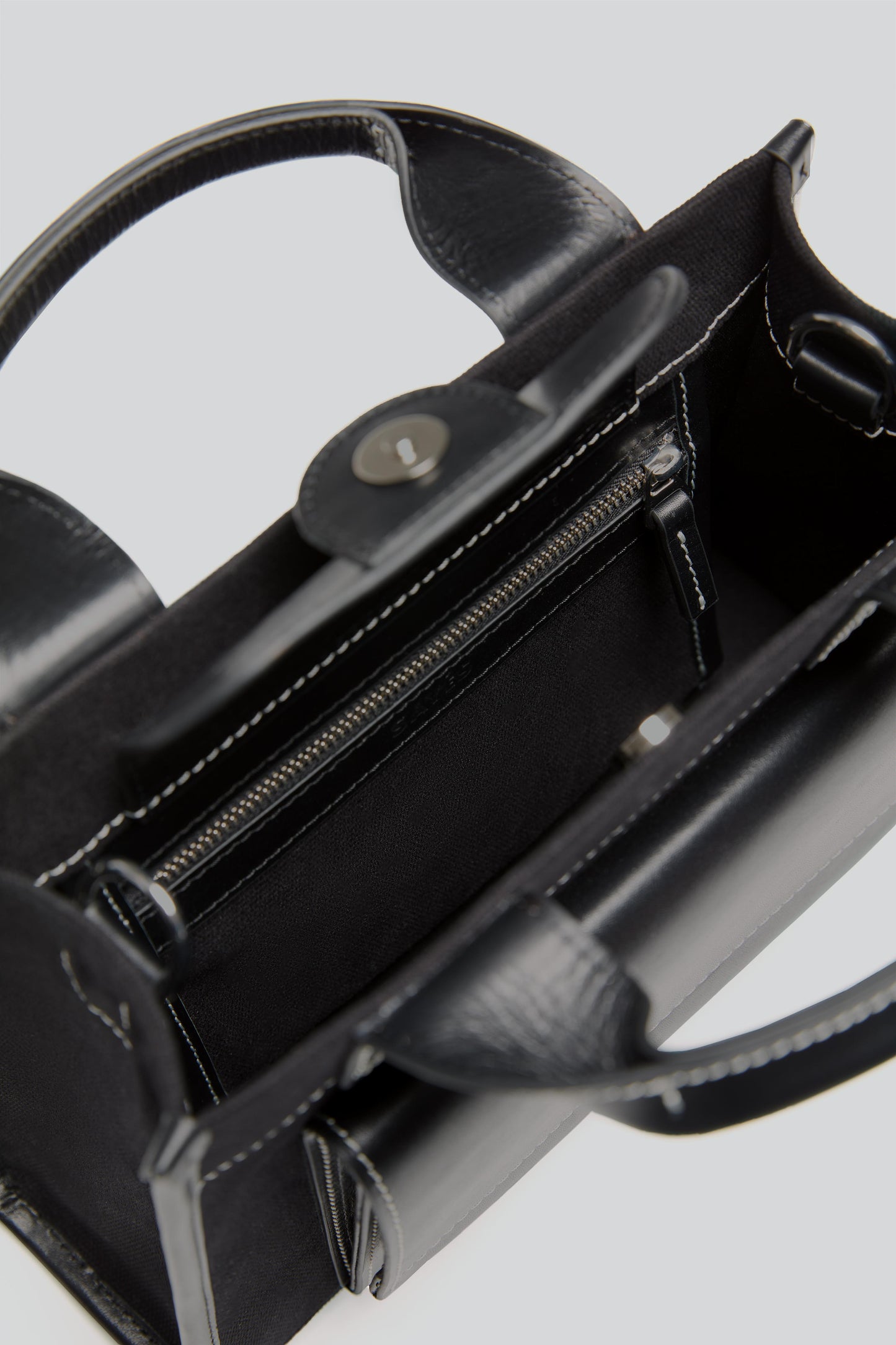 STITCHED POCKET MINI TOTE BAG IN BLACK