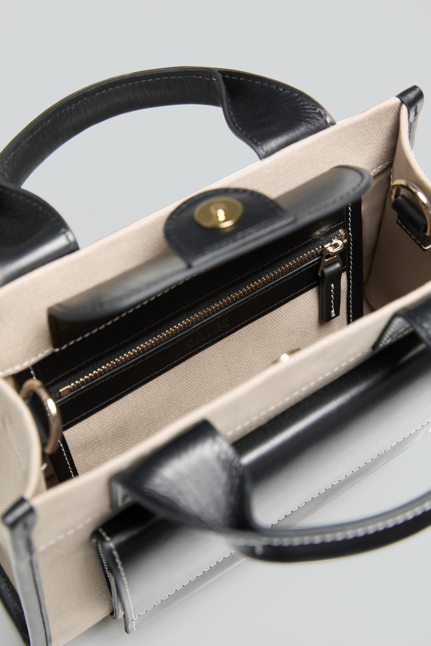 STITCHED POCKET MINI TOTE IN BEIGE AND BLACK