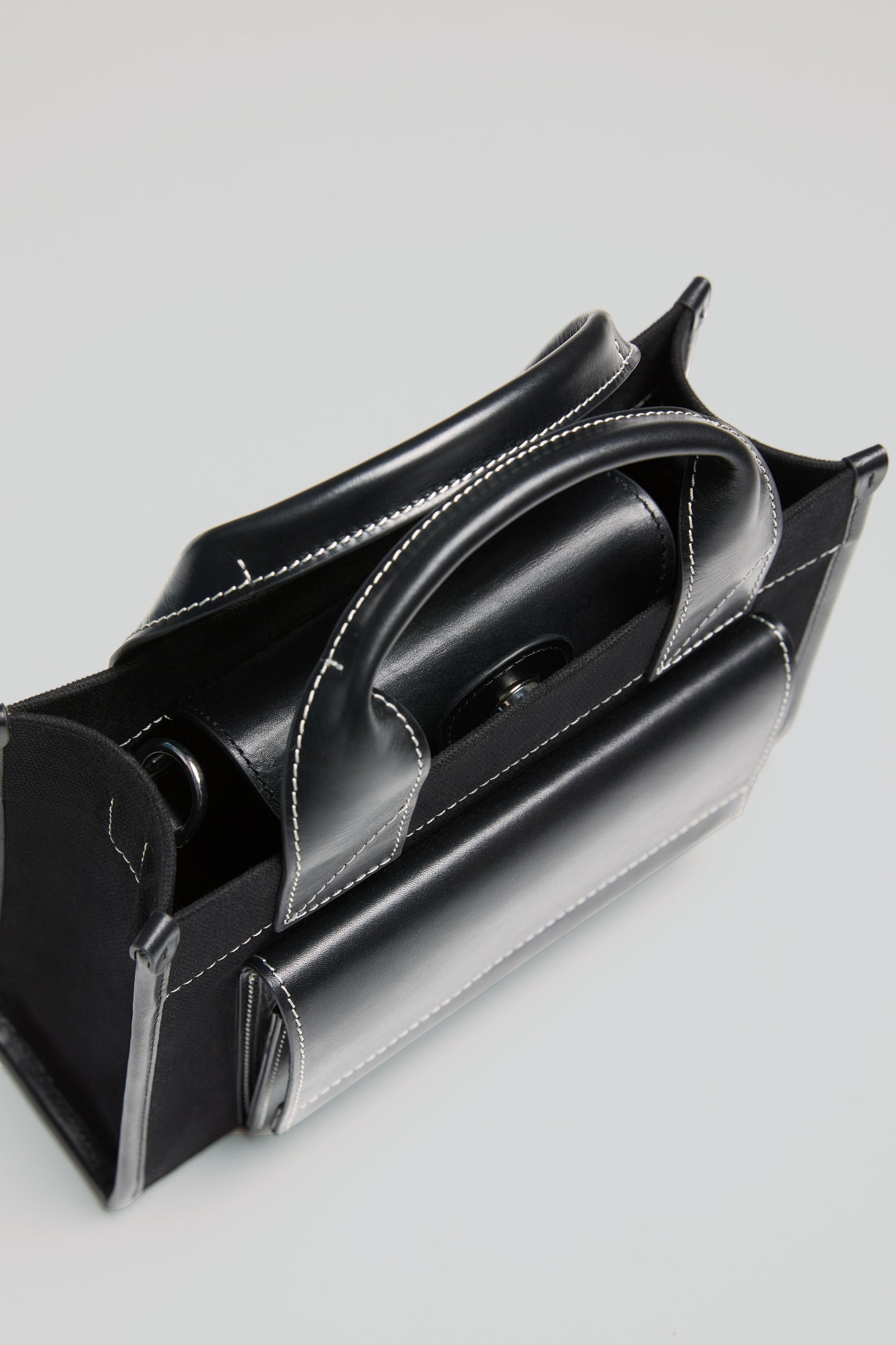 STITCHED POCKET MINI TOTE BAG IN BLACK