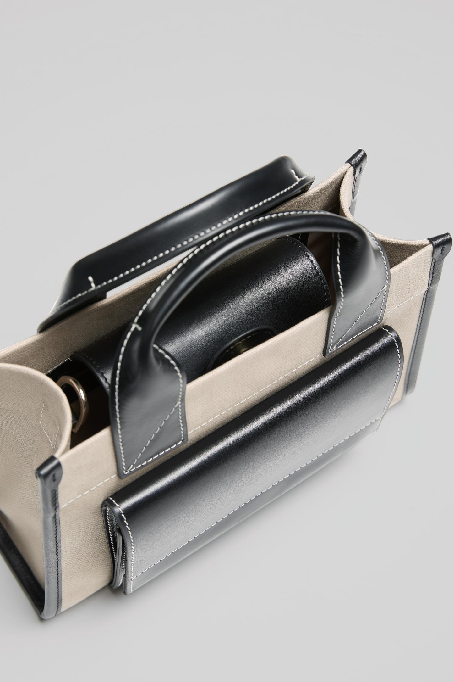 STITCHED POCKET MINI TOTE IN BEIGE AND BLACK