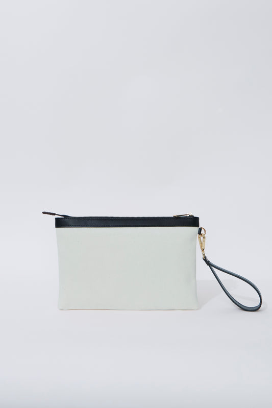 STITCHED CLUTCH IN WHITE AND BLACK