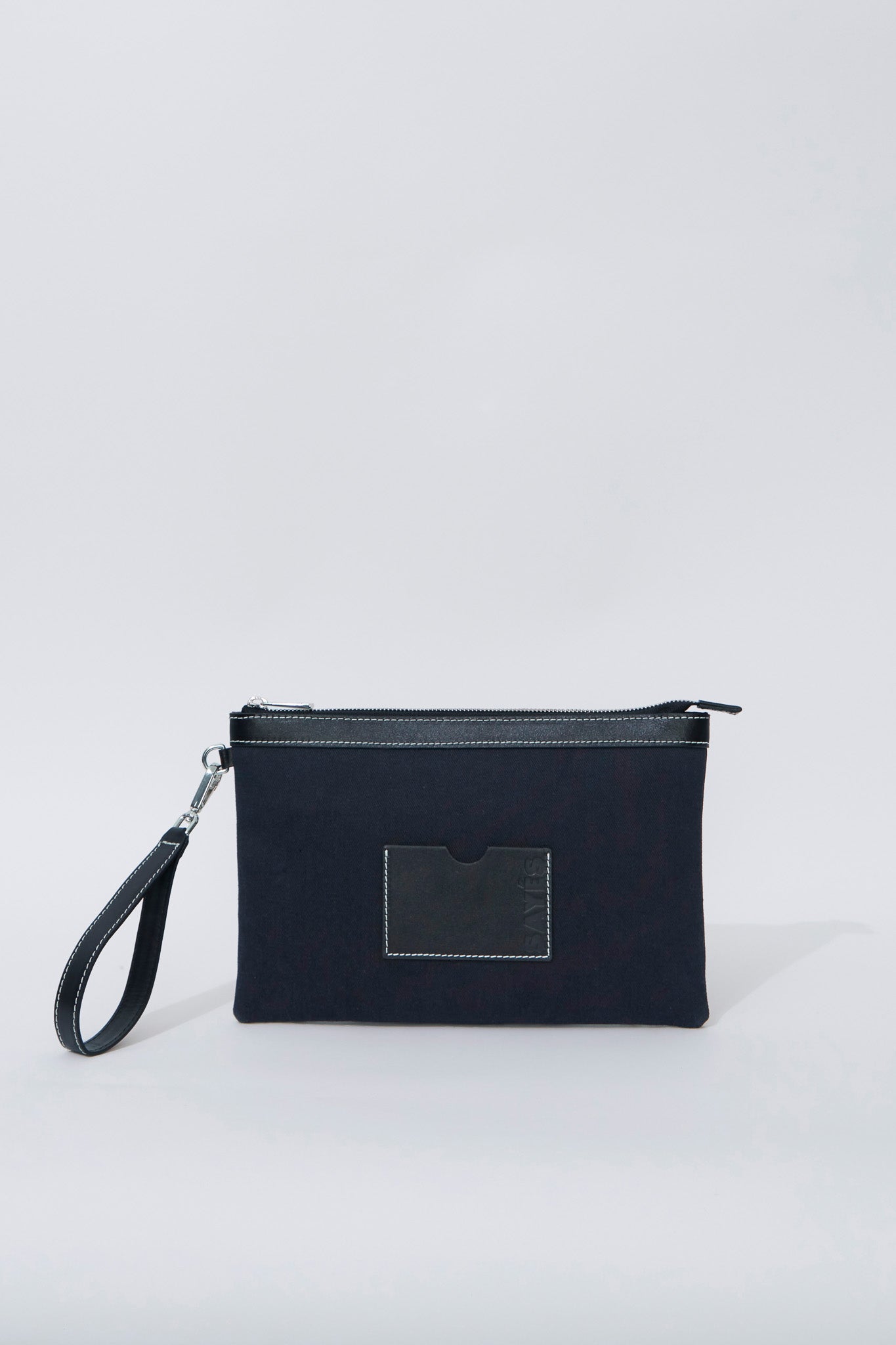 STITCHED CLUTCH IN NAVY AND BLACK