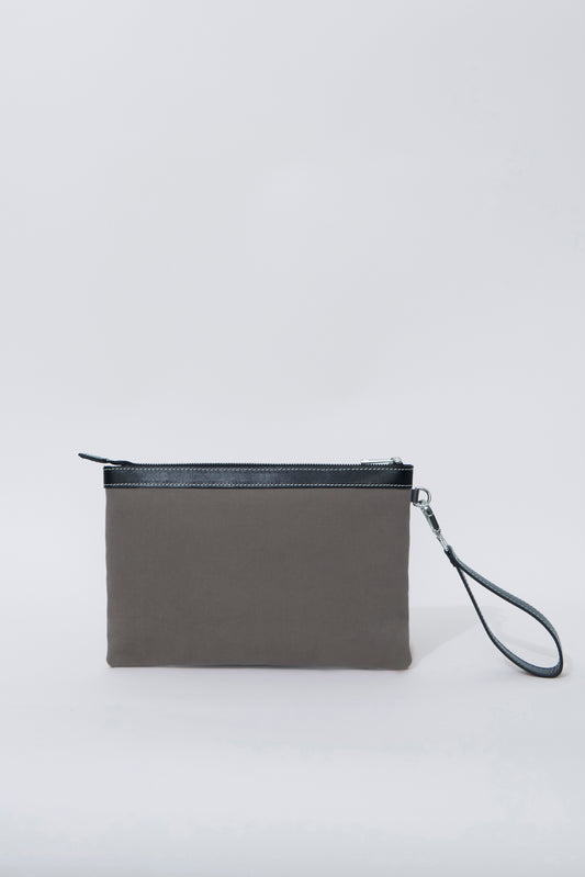 STITCHED CLUTCH IN MINK AND BLACK