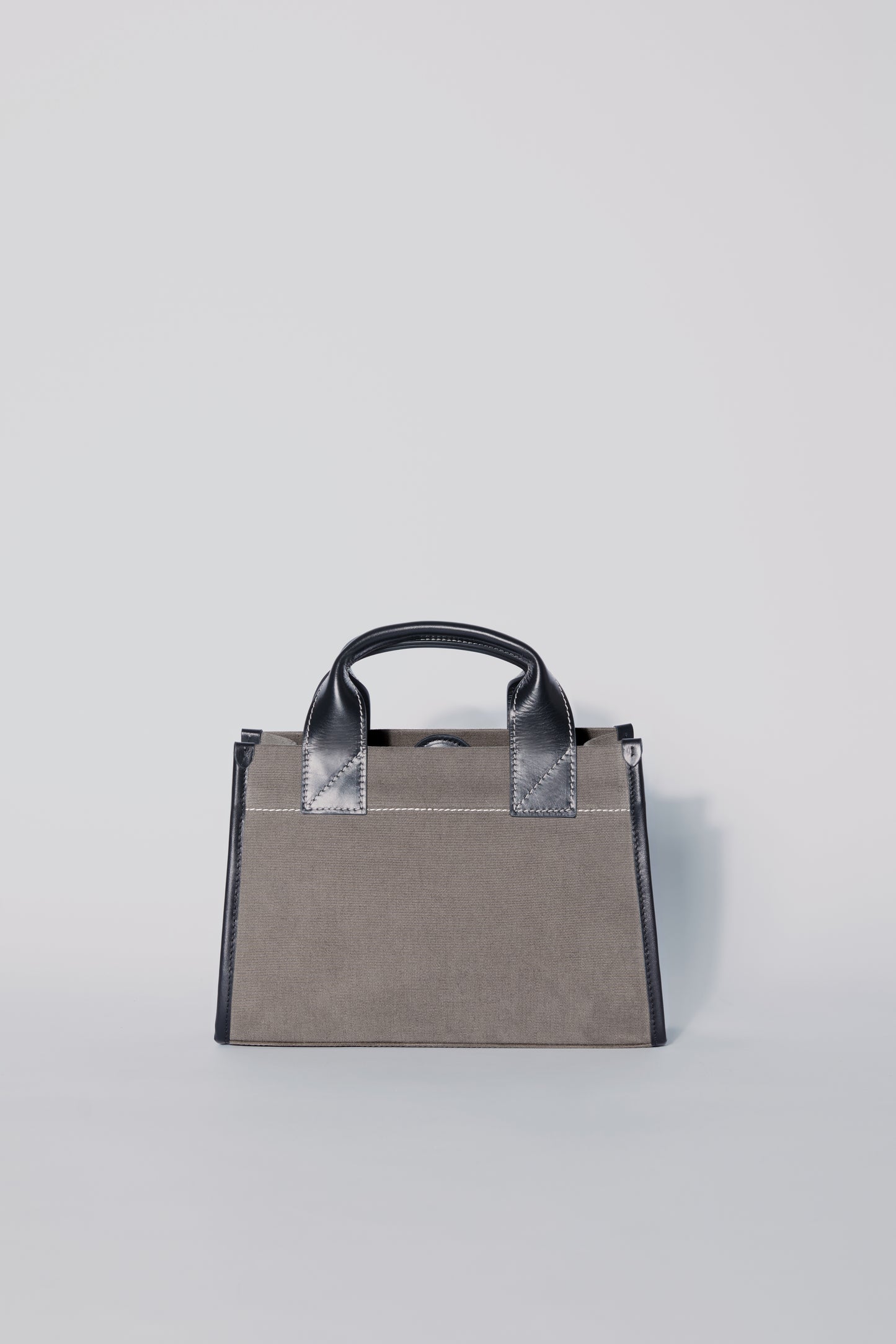 STITCHED POCKET MINI TOTE BAG IN MINK AND BLACK