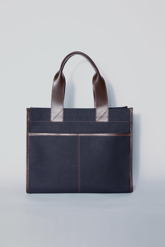 STITCHED POCKET MAXI TOTE BAG IN NAVY AND BROWN