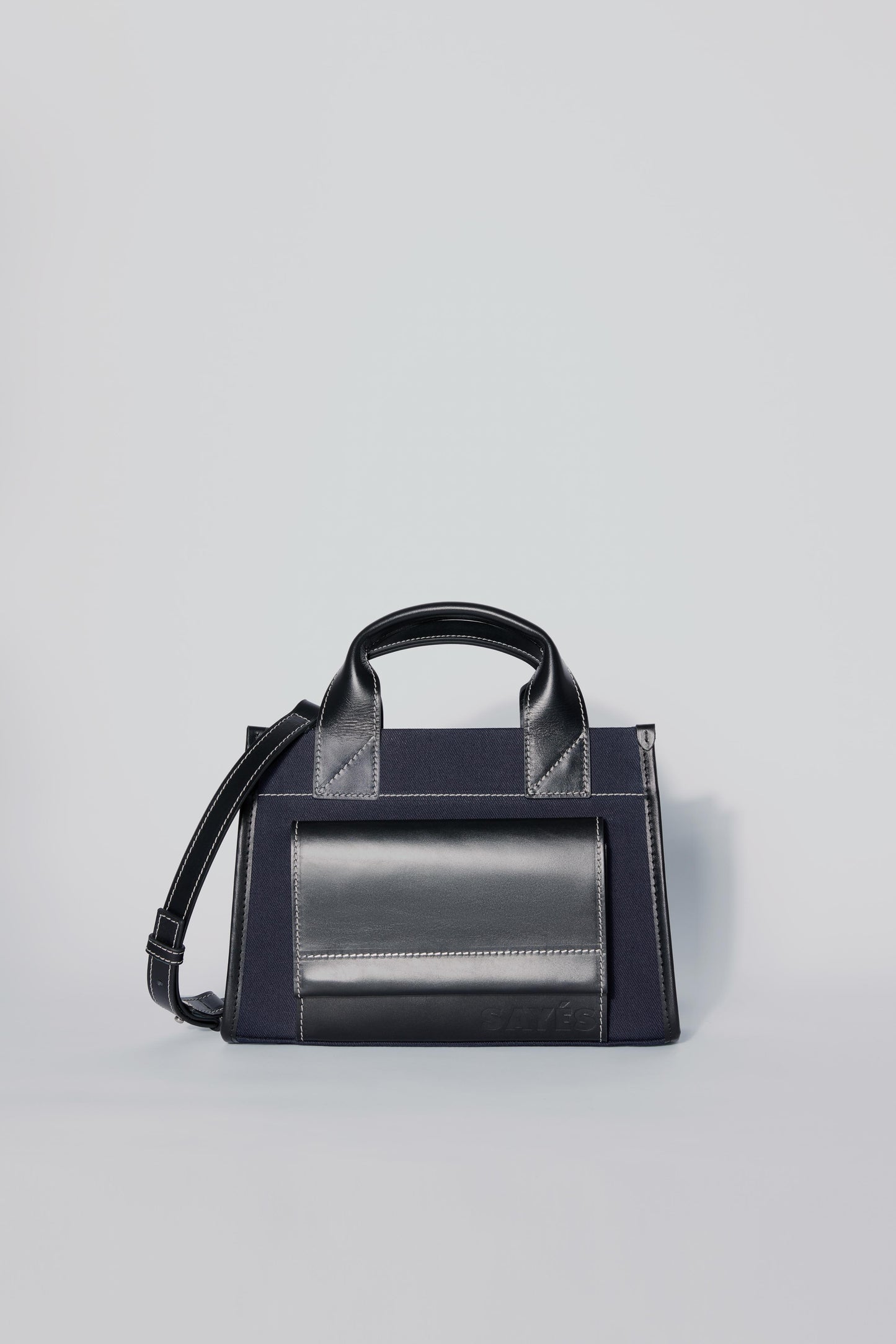 STITCHED POCKET MINI TOTE BAG IN NAVY AND BLACK