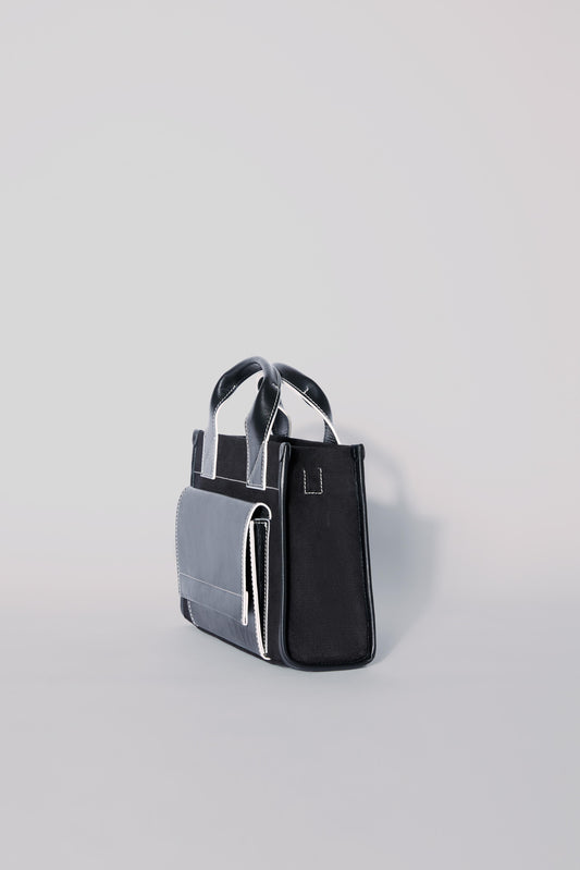 STITCHED POCKET MINI TOTE BAG IN BLACK WITH OFF-WHITE EDGES