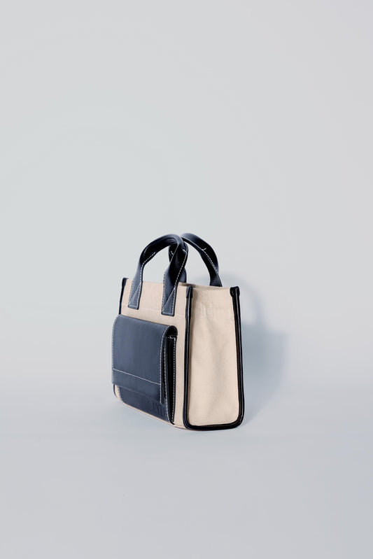 STITCHED POCKET MINI TOTE IN BEIGE AND BLACK